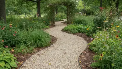 Pea gravel garden pathway in Overland Park, KS showcasing professional landscaping design and drainage