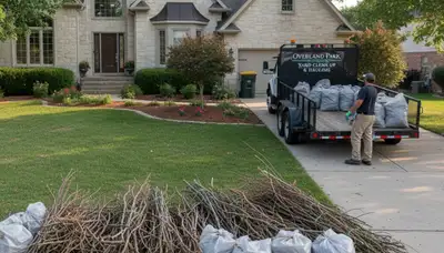Professional yard waste cleanup and debris hauling in Overland Park, KS by Chop Chop Landscaping